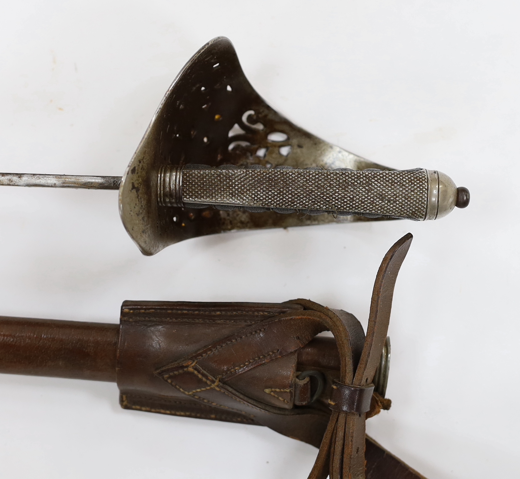 A George V 1897 pattern infantry officer's sword, with scabbard and leather hanger, blade 82cm